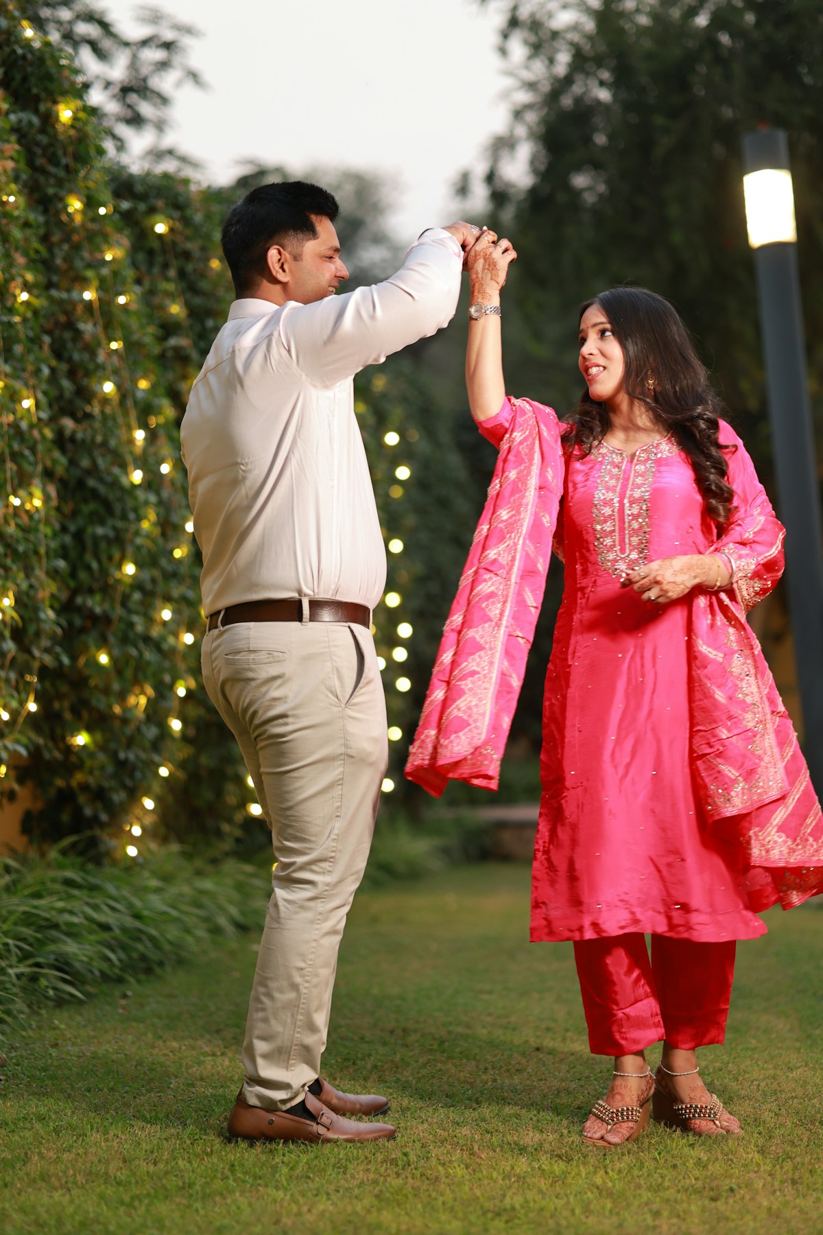 Wedding couple sharing an intimate moment in a garden setting