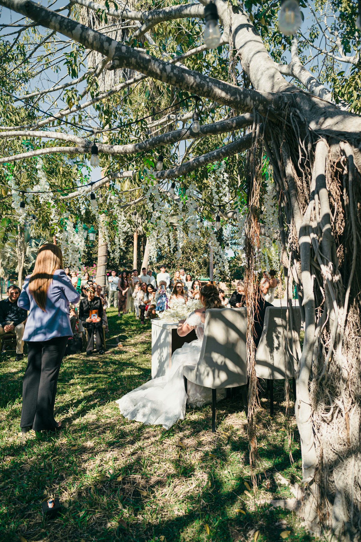 Dreamy backyard wedding venue with twinkling lights at dusk